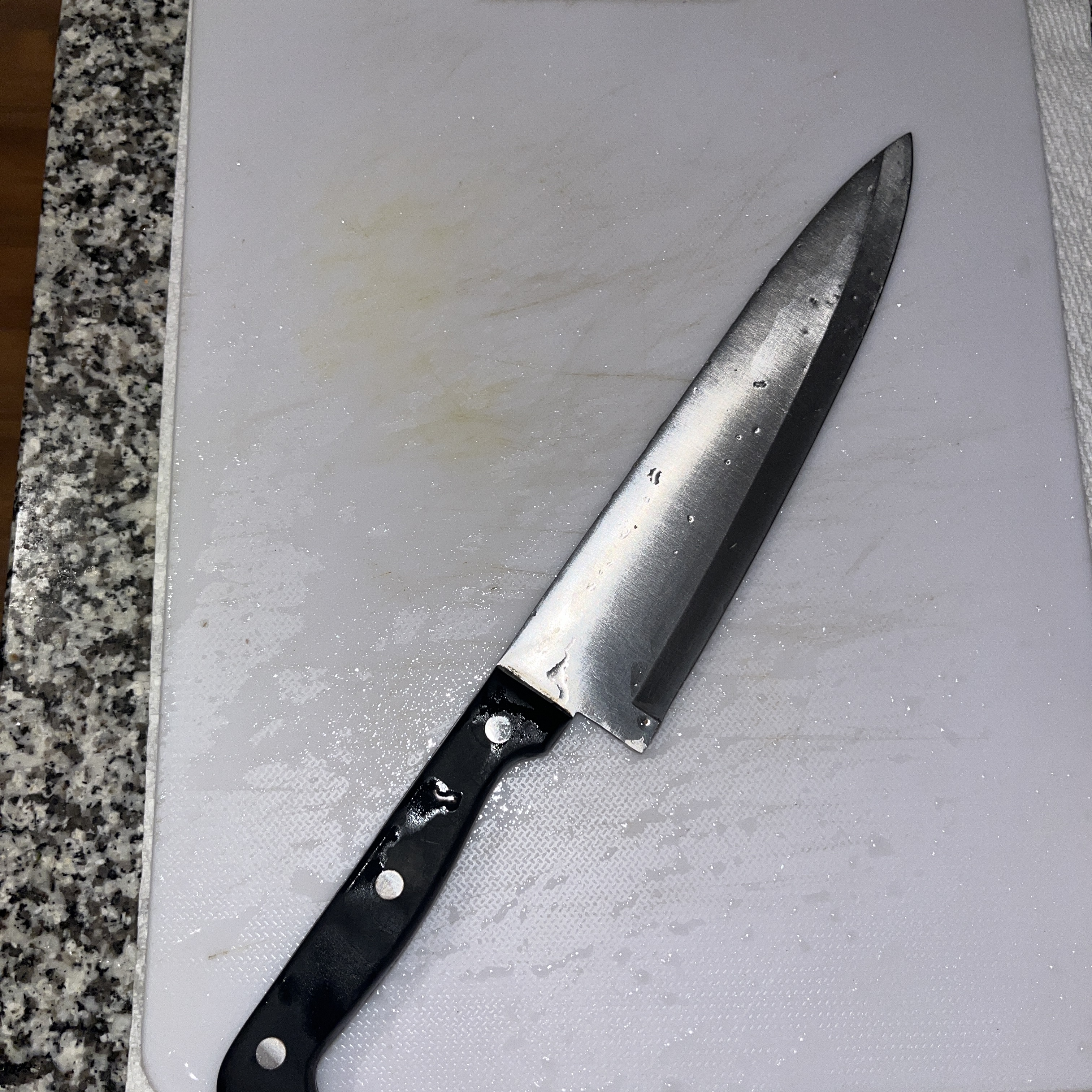 The sound of a knife cutting vegetables.