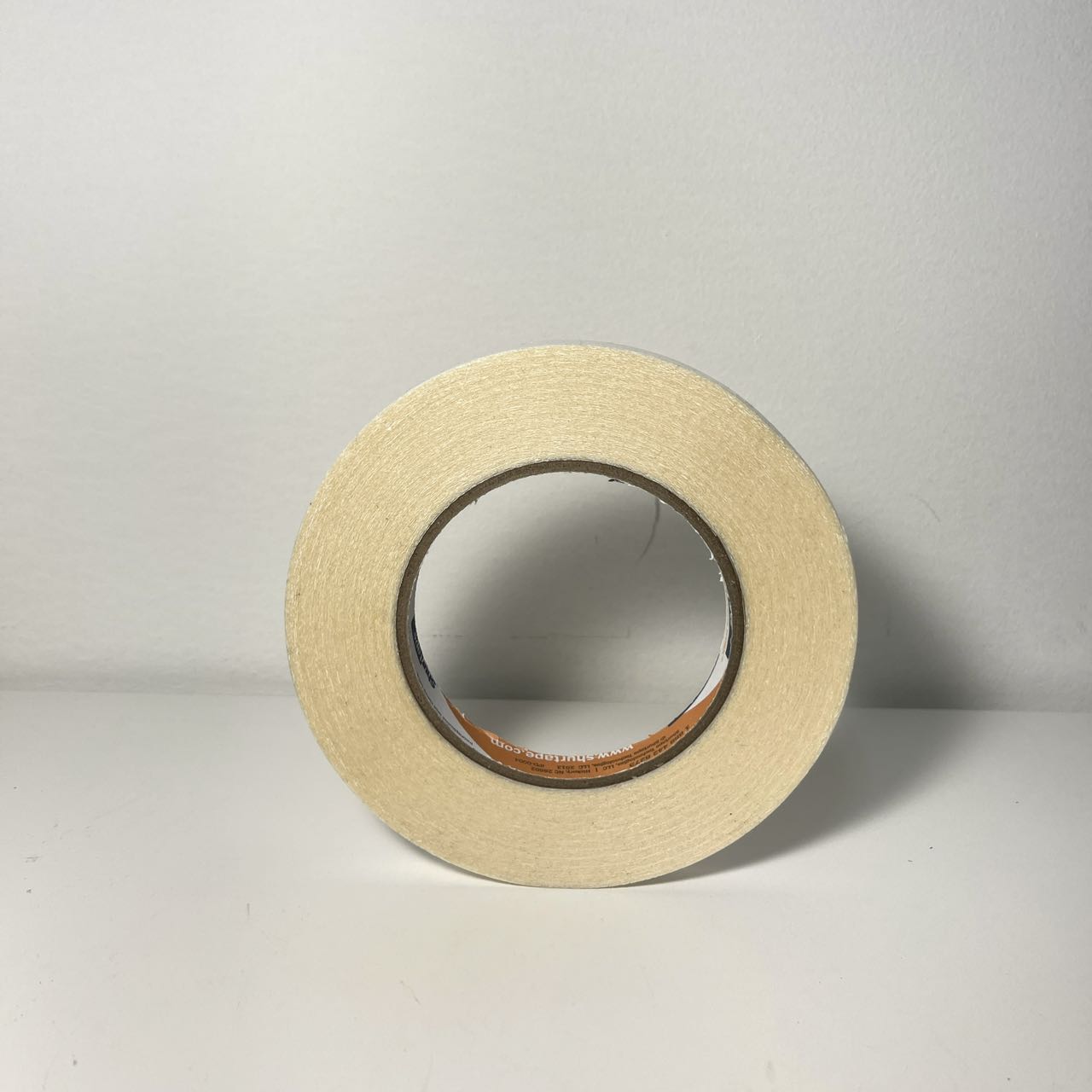 Double-sided tape standing on a table