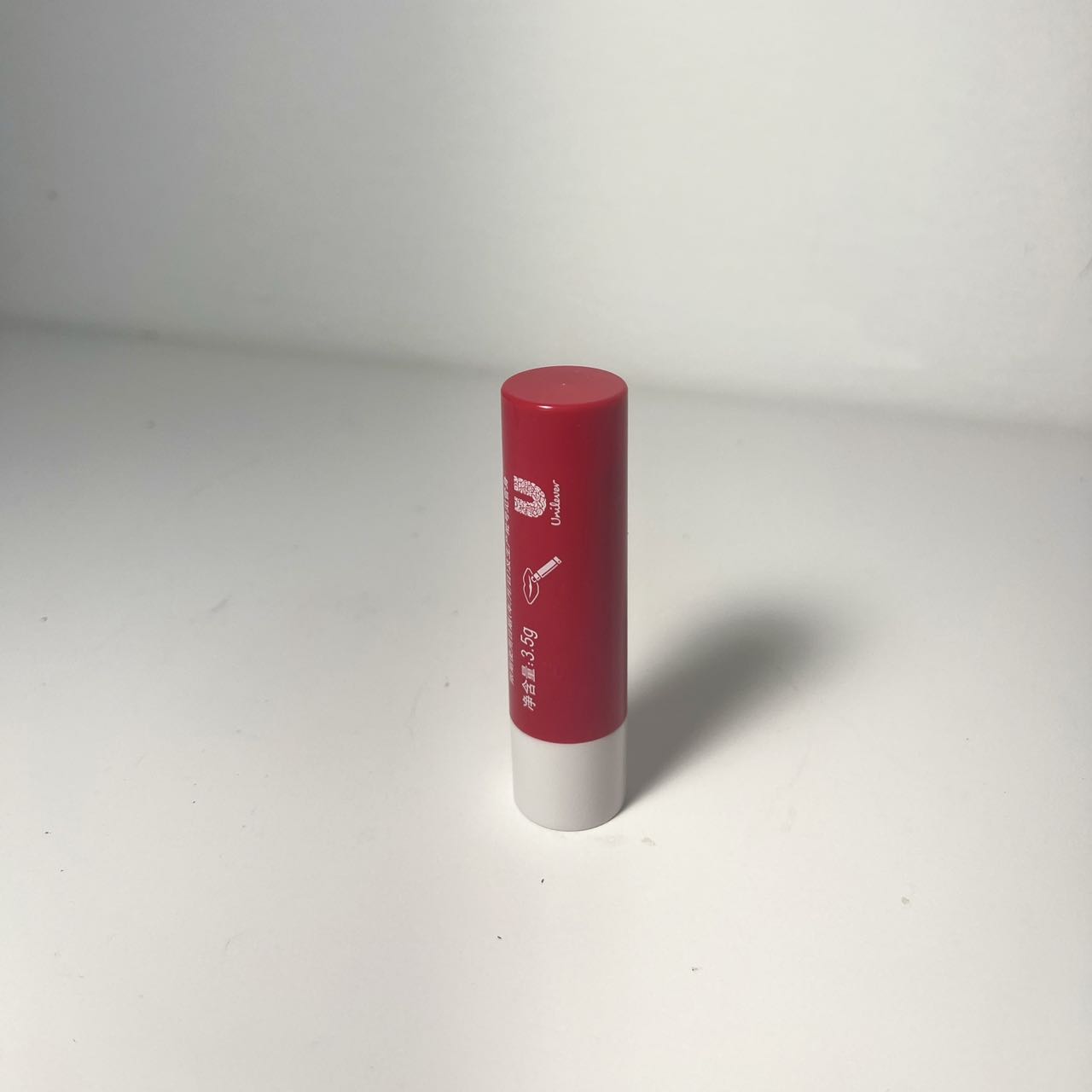 Positive photo of a cylindrical lipstick